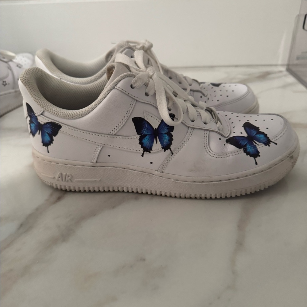 Nike White Sneakers with Blue Accents